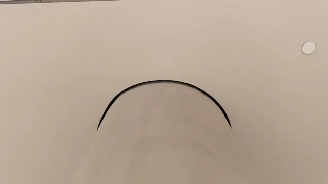 Curved shadow gap in a ceiling