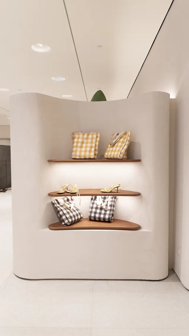 Lit shelf niche in a curved wall