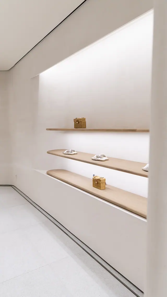 Lit wall with built-in shelves