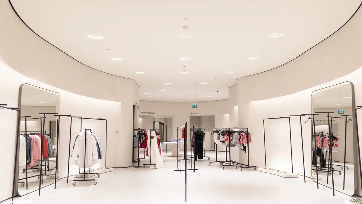 Large retail floor with curved ceiling transitions